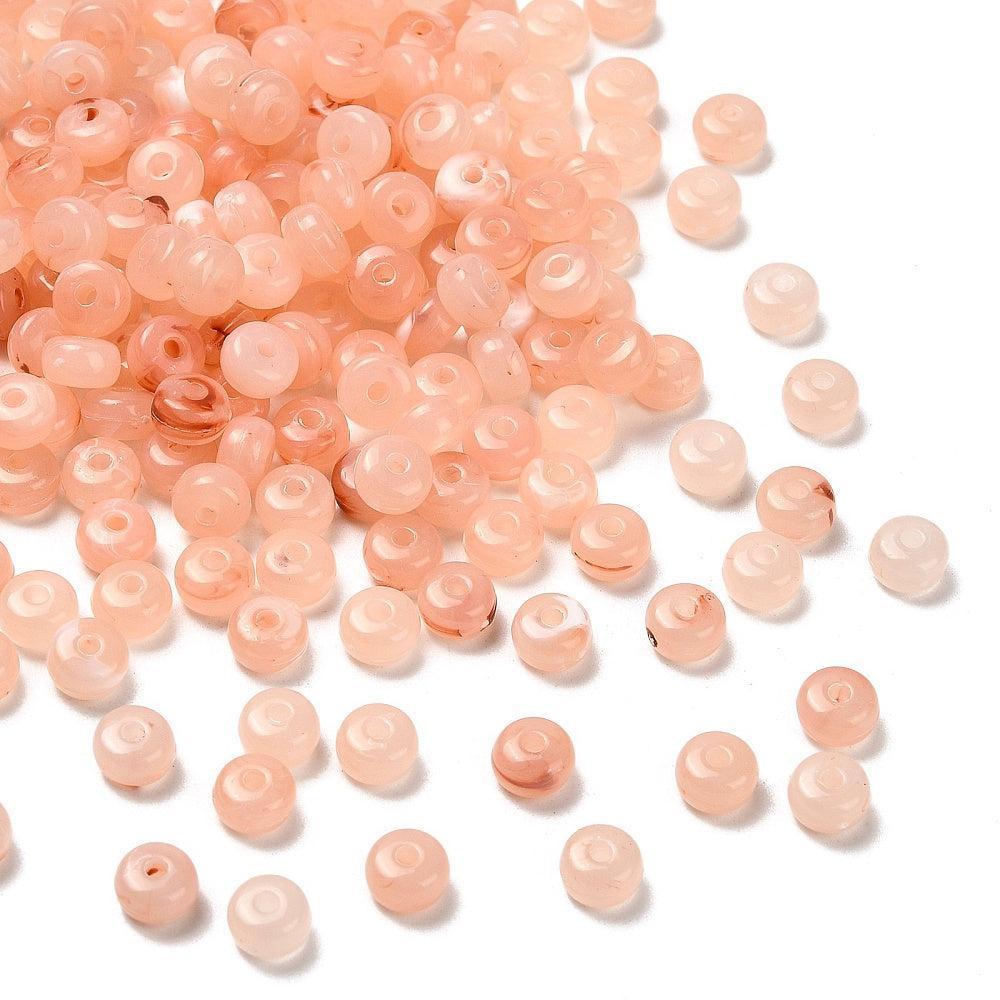 Acryl Kralen rondel Transparant Zalm Roze 7x4mm - 38 stuks-Kralen-Kraaltjes van Renate