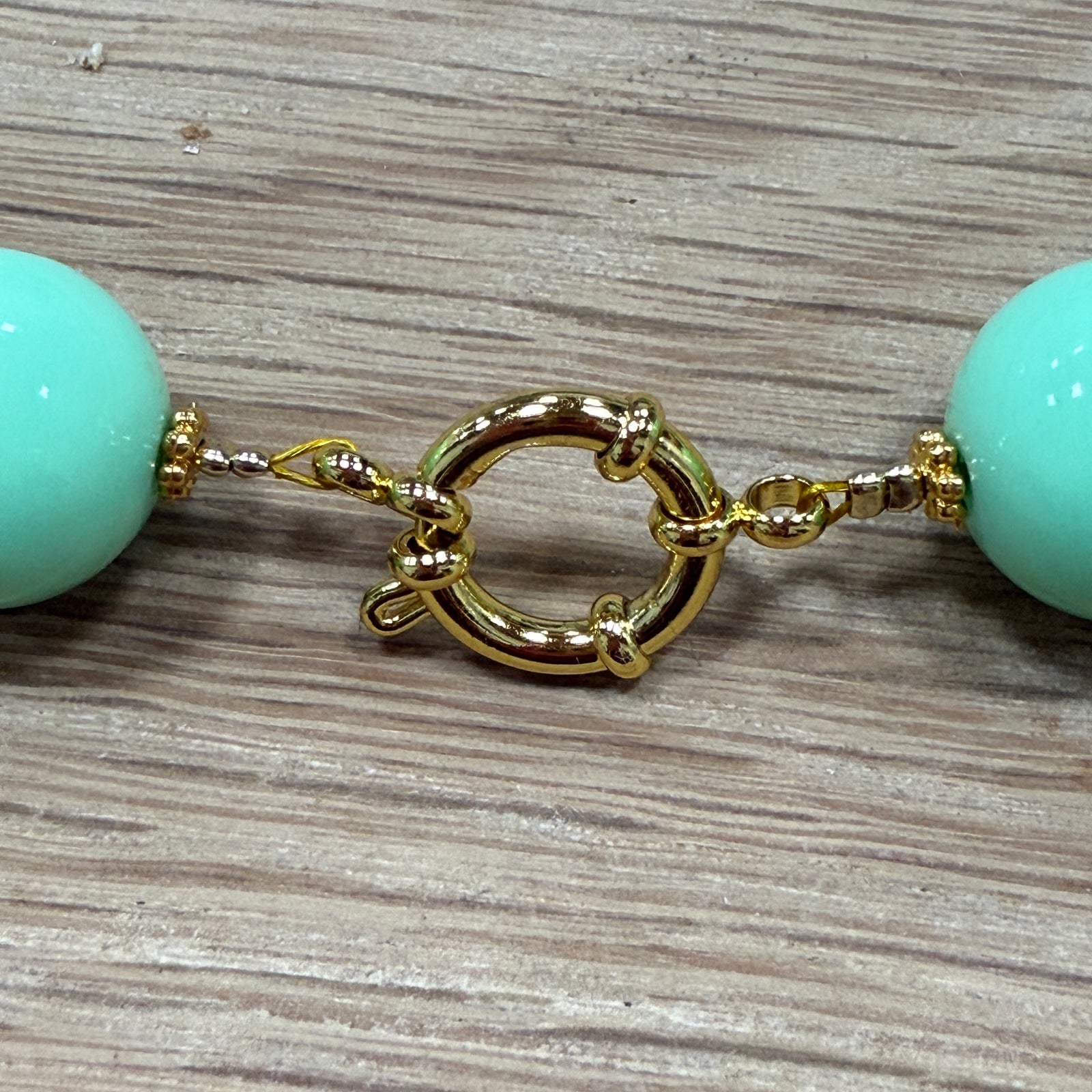 	DIY rijgset goud met rol gecoat ijzerdraad, knijpkralen en Premium RVS boeisluiting