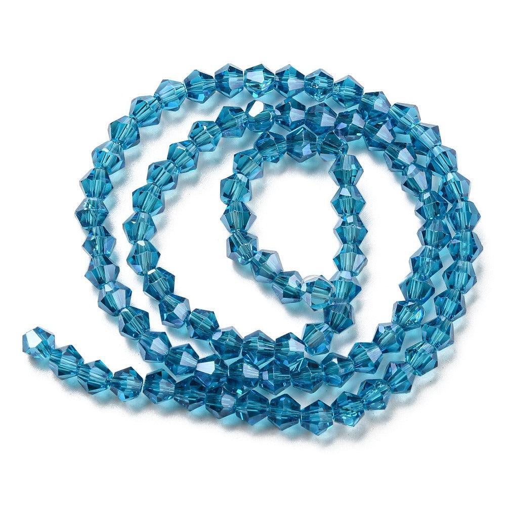 Glaskralen Facet Bicone Transparant Jeansblauw 4mm - ± 38 stuks-Kralen-Kraaltjes van Renate