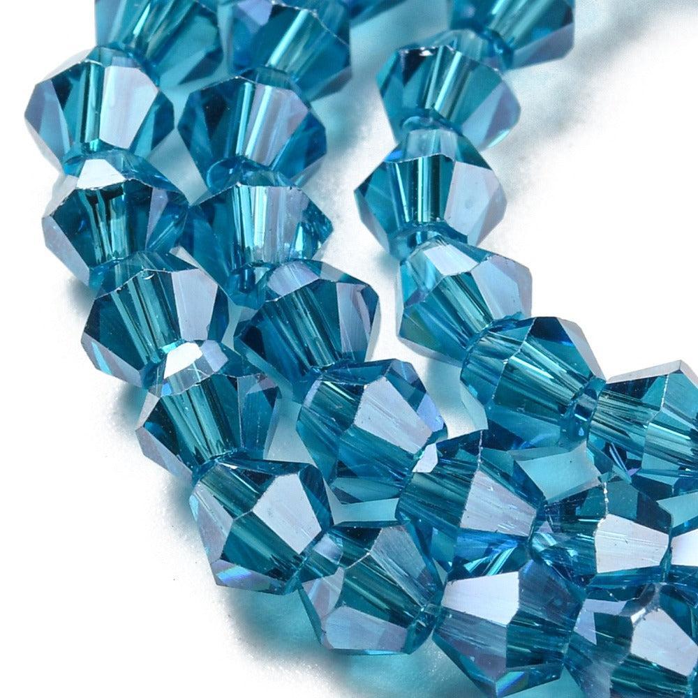 Glaskralen Facet Bicone Transparant Jeansblauw 4mm - ± 38 stuks-Kralen-Kraaltjes van Renate