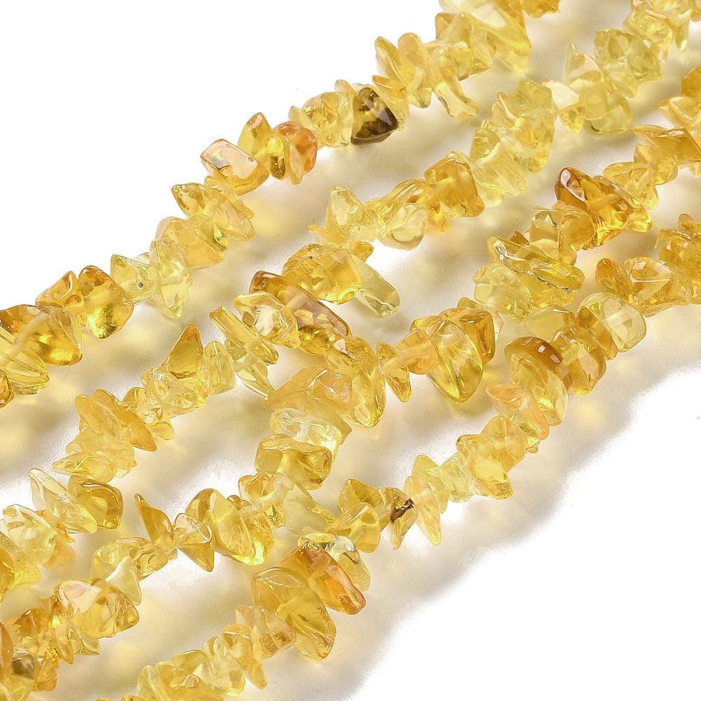 Glaskralen goldenrod chips ±5x10mm- per 19cm-Kralen-Kraaltjes van Renate