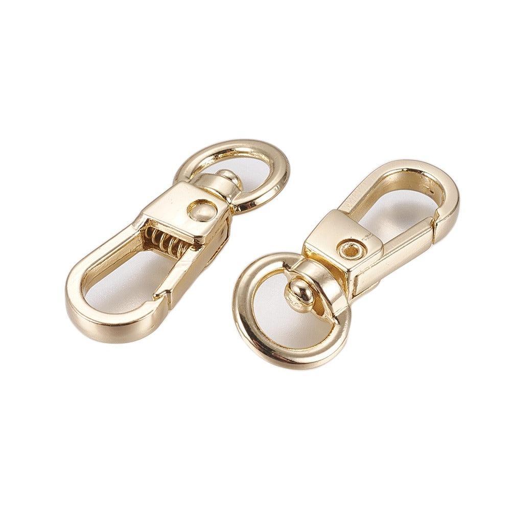 Karabijnsluiting Draaibaar Metaal Lichtgoud 32x13mm - per stuk-Sluitingen-Kraaltjes van Renate