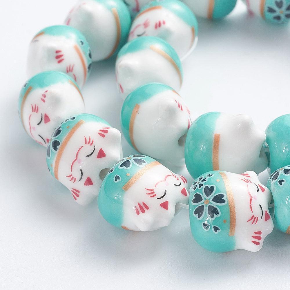 Keramiek kraal Lucky Cat Turquoise 14mm- per stuk-Kralen-Kraaltjes van Renate