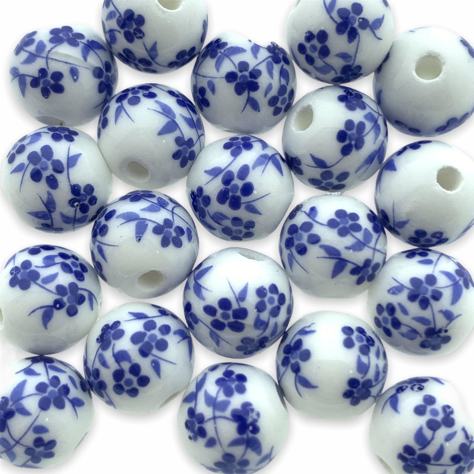 Keramiek kraal flower blauw (ø2mm) 10mm-Kraaltjes van Renate
