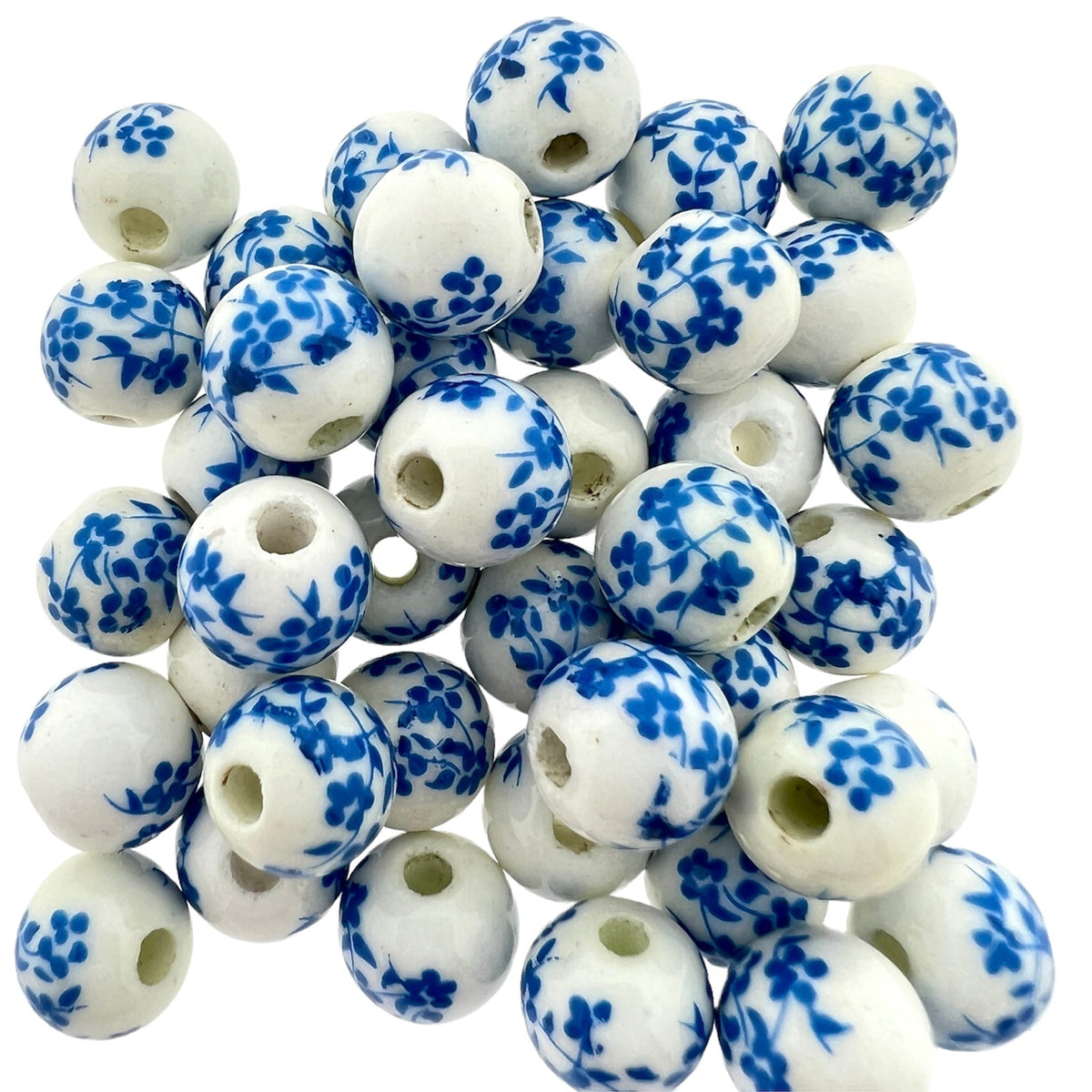Keramiek kraal flower lichtblauw-wit (ø2mm) 8mm-Kralen-Kraaltjes van Renate