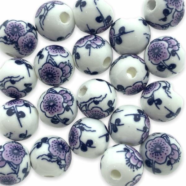 Keramiek kraal flower paars (ø2mm) 10mm-Kraaltjes van Renate