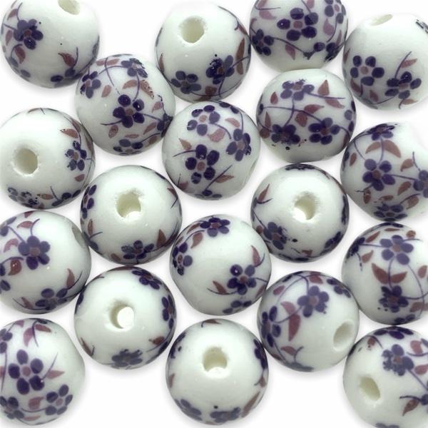 Keramiek kraal flower paars (ø2mm) 10mm-Kraaltjes van Renate