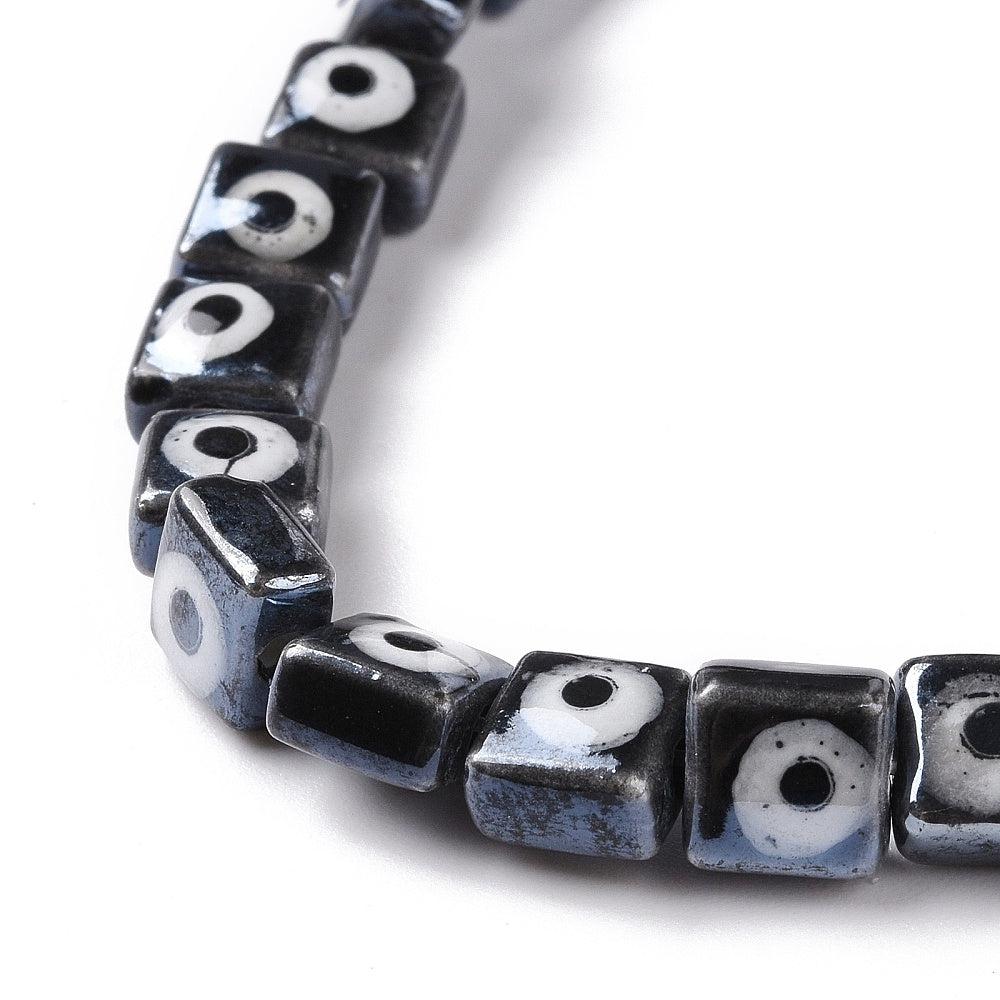 Keramiek kraal plat vierkant met evil eye 17x14mm - per stuk-Kralen-Kraaltjes van Renate