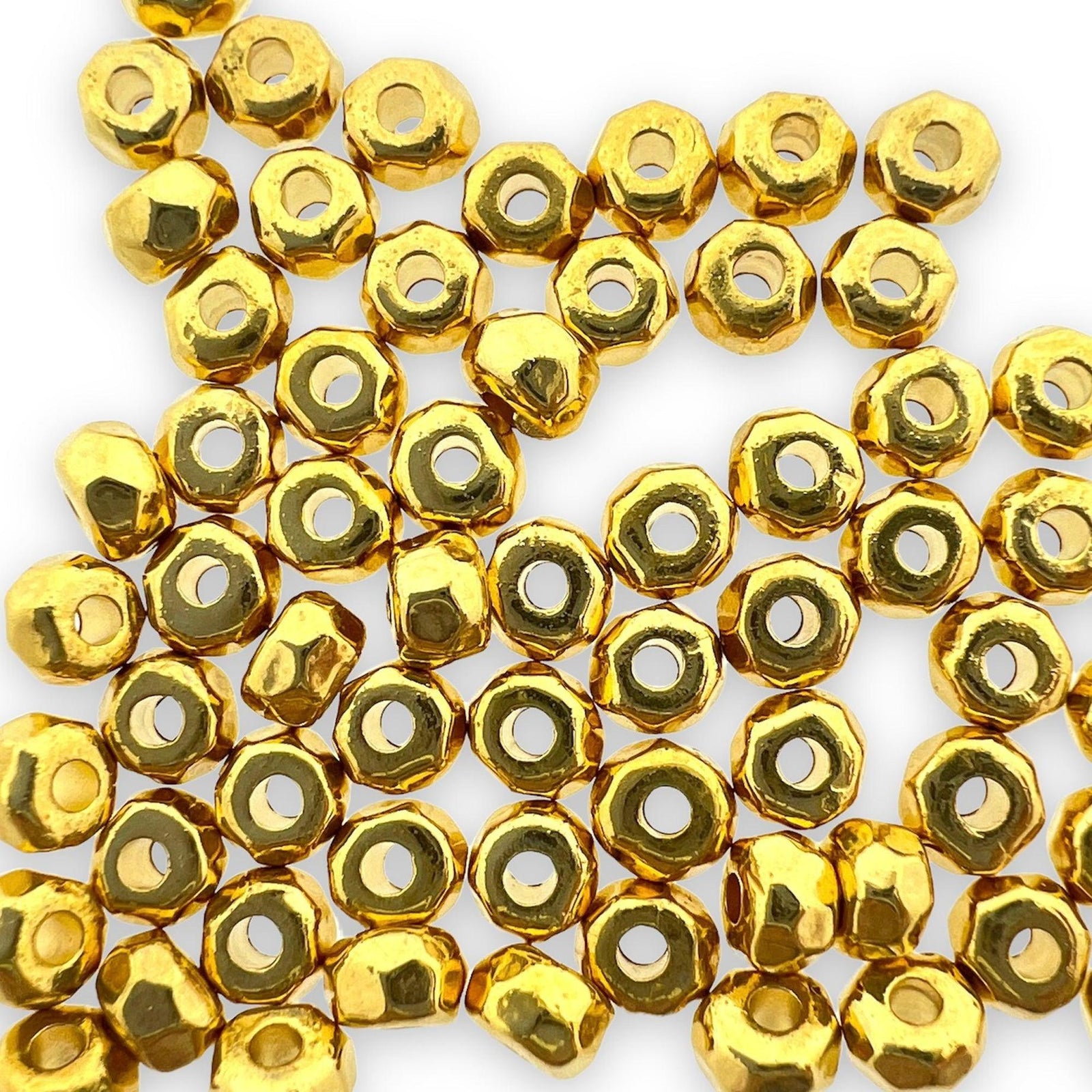 Kraal hexagon facet Ø1,5mm Goud DQ 3x3,4mm-Kralen-Kraaltjes van Renate