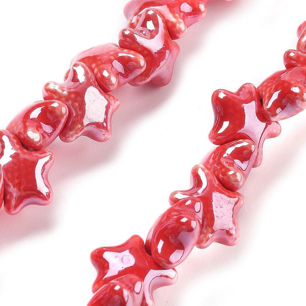 Kraal porselein zeester rood 12mm - per stuk-Kralen-Kraaltjes van Renate