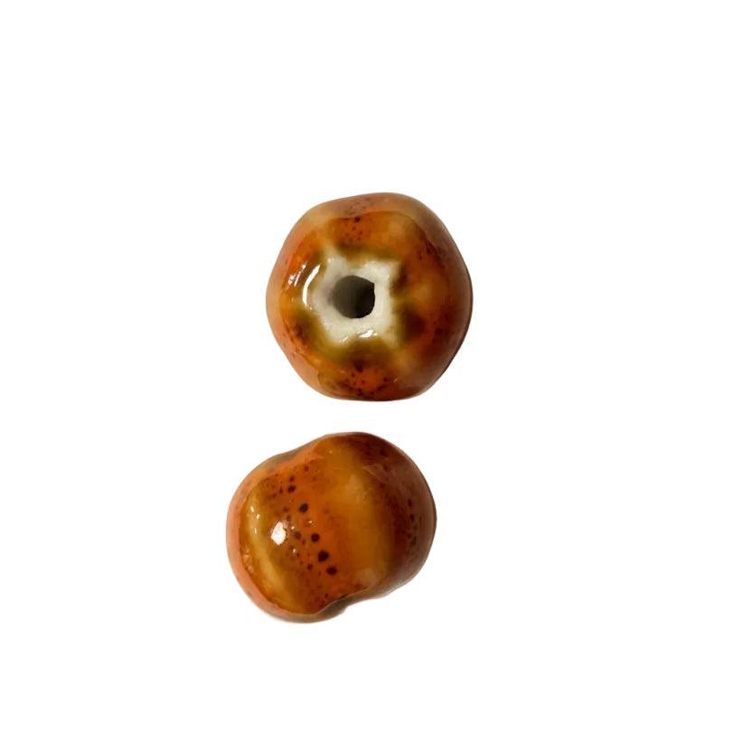 Porseleinen Kralen Rondel Oranje 12mm - per stuk-Kralen-Kraaltjes van Renate