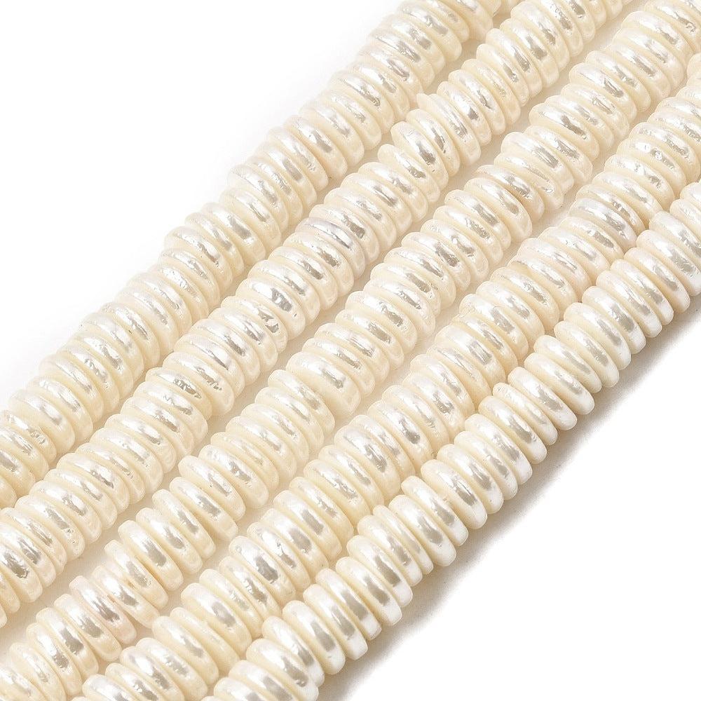 Schelp kralen Heishi Disc Parelmoer wit 7x2mm - 10 stuks-Kralen-Kraaltjes van Renate