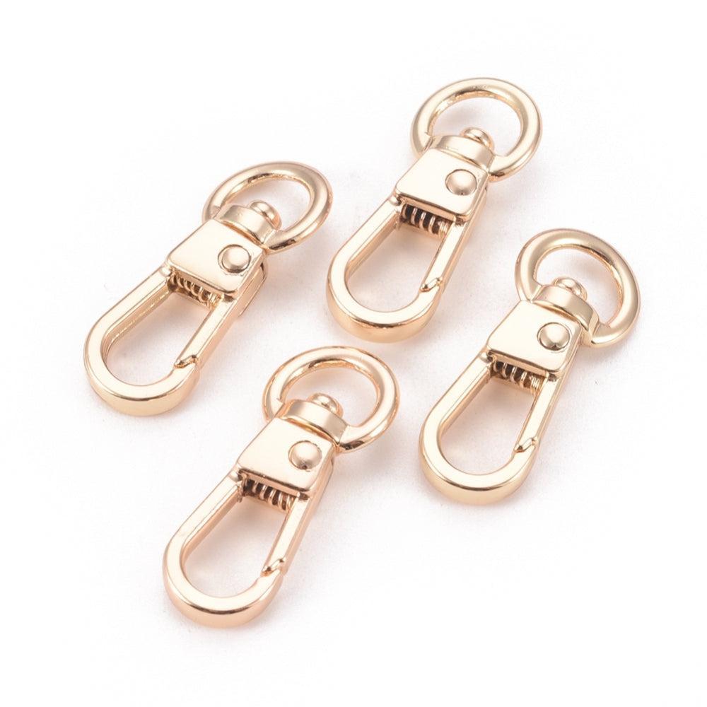 Sleutelhanger Karabijn Draaibaar Metaal Goud 31.5x12.5mm - per stuk-Sluitingen-Kraaltjes van Renate