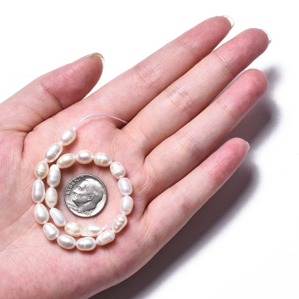 Zoetwaterparel lang 6mm wit - per stuk-Kralen-Kraaltjes van Renate