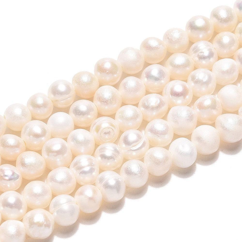 Zoetwaterparel rond 4mm off white - per stuk-Kralen-Kraaltjes van Renate